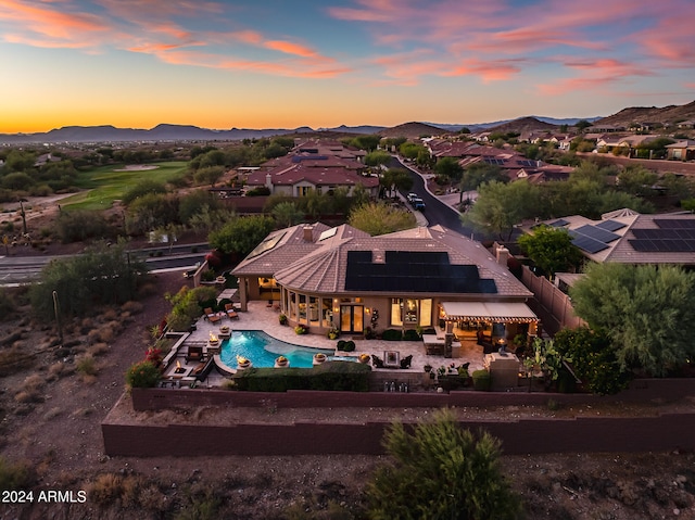 aerial view at dusk with a mountain view