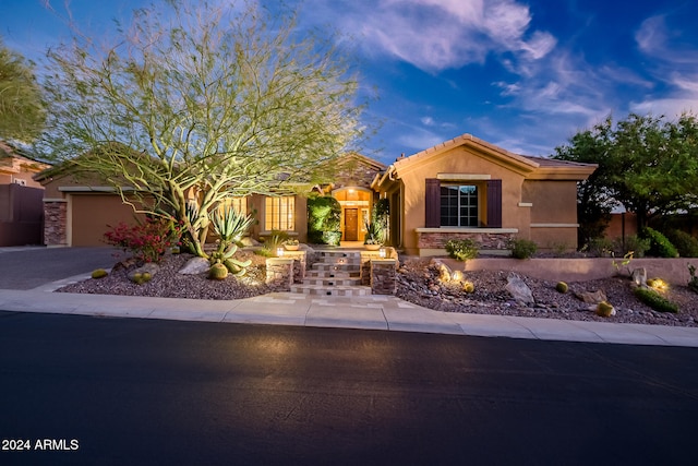 view of front of home with a garage