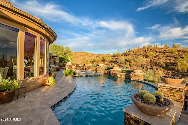 view of pool with a patio area