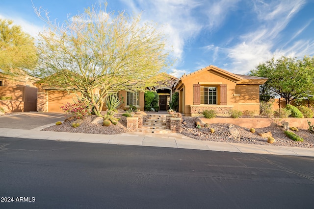 view of front of home with a garage