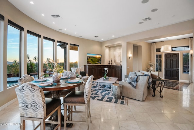 dining room featuring light tile patterned flooring