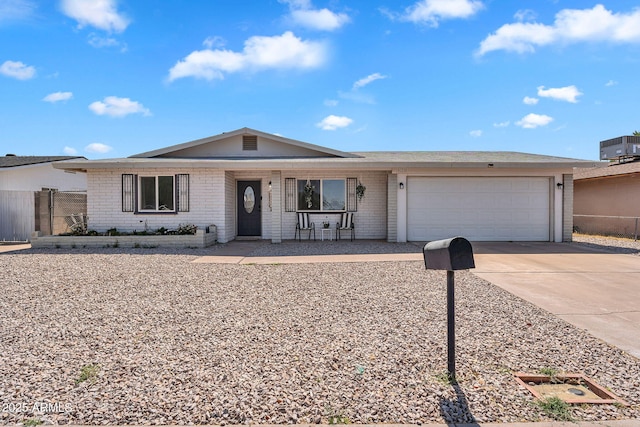 625 S Daley, Mesa, AZ 85204 - ranch-style house with an attached garage, driveway, brick siding, central AC unit, and covered porch