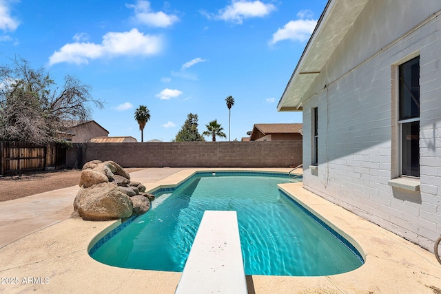 625 S Daley, Mesa, AZ 85204 - view of swimming pool featuring a fenced backyard, a patio, and a diving board