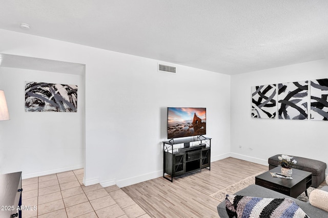 625 S Daley, Mesa, AZ 85204 - living area with a textured ceiling, baseboards, and wood finished floors