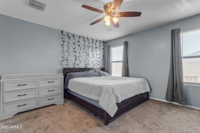 9442 E Silo Rd, Florence, AZ 85132 - bedroom featuring light carpet, a ceiling fan, and baseboards
