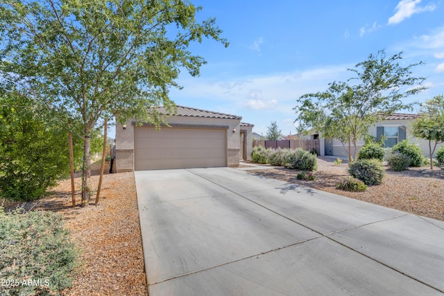 9442 E Silo Rd, Florence, AZ 85132 - view of front facade with stucco siding, a tiled roof, and driveway