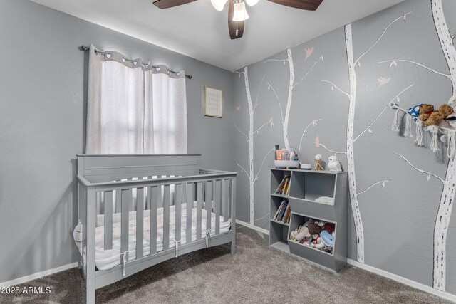 9442 E Silo Rd, Florence, AZ 85132 - carpeted bedroom with a crib, ceiling fan, and baseboards