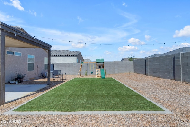 9442 E Silo Rd, Florence, AZ 85132 - view of yard featuring a playground and a patio