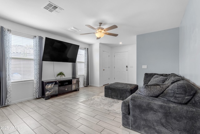 9442 E Silo Rd, Florence, AZ 85132 - living area featuring a ceiling fan, baseboards, and recessed lighting