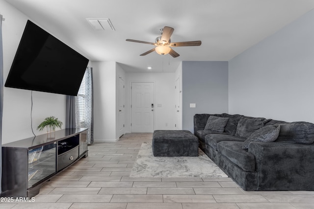 9442 E Silo Rd, Florence, AZ 85132 - living area featuring ceiling fan, wood finish floors, and recessed lighting