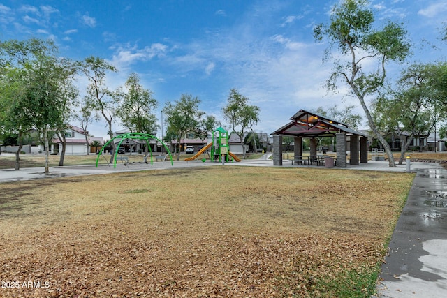 communal playground featuring a yard and a gazebo