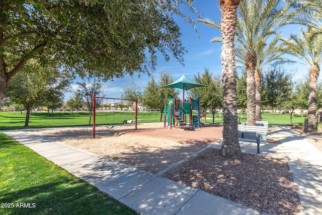 communal playground with a lawn