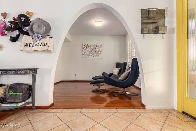 sitting room featuring light tile patterned floors