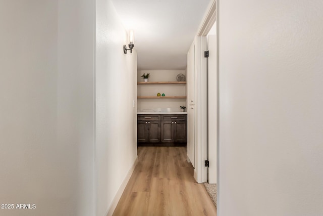 hallway featuring light wood-type flooring