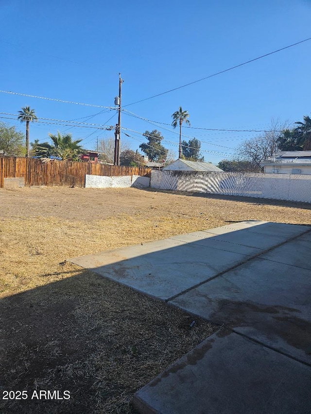 view of yard with fence