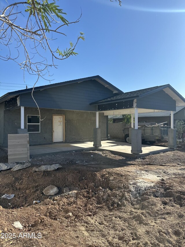 1110 E Pierce St, Phoenix, AZ 85006 - view of front of house with a patio and concrete block siding