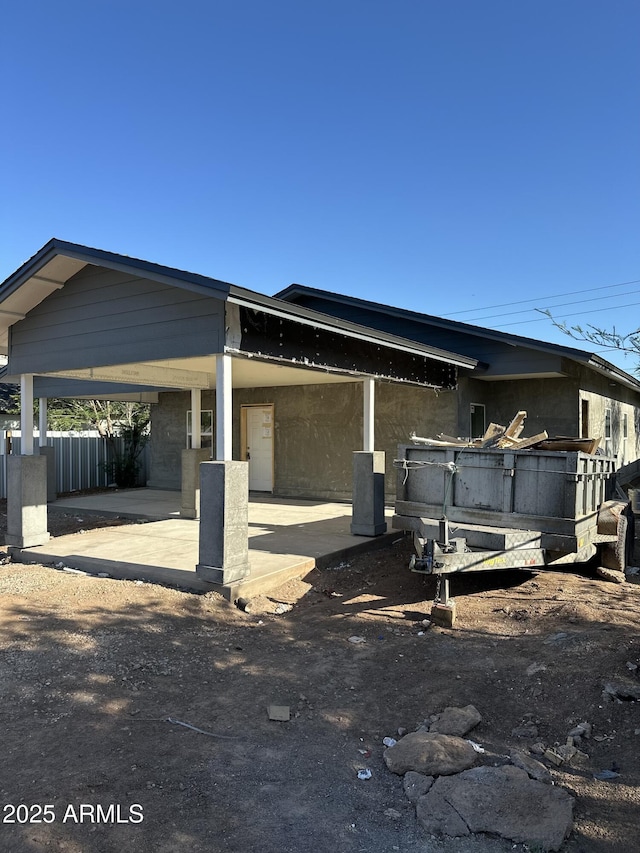 1110 E Pierce St, Phoenix, AZ 85006 - view of side of property with an attached carport