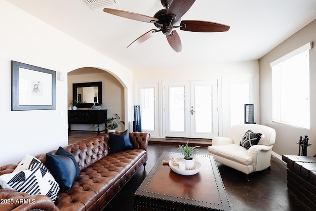 living room with hardwood / wood-style floors and ceiling fan