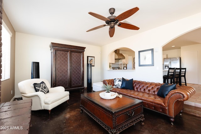 living room featuring ceiling fan