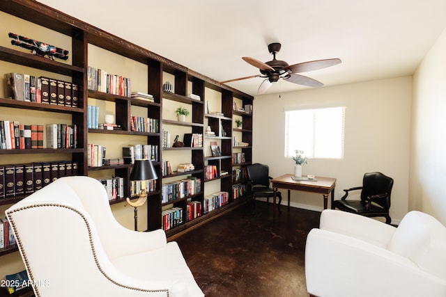 living area with ceiling fan