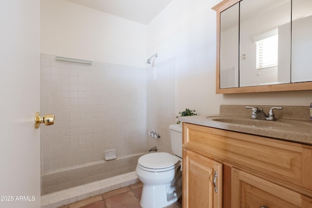 bathroom with vanity, tile patterned floors, toilet, and walk in shower