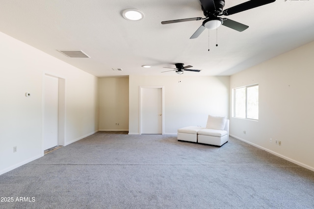 unfurnished room with light colored carpet