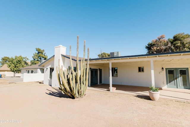 back of house with a patio area