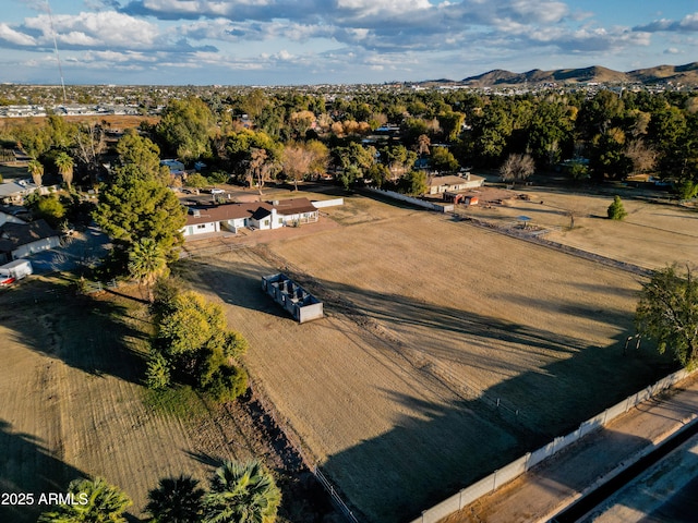 birds eye view of property featuring a mountain view