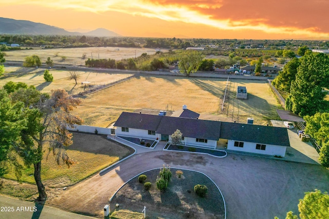 aerial view at dusk with a mountain view