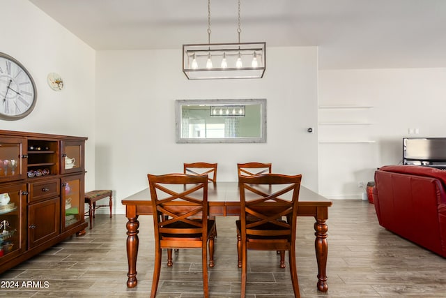 dining area with wood-type flooring