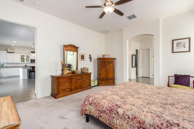 bedroom featuring ceiling fan and wood-type flooring