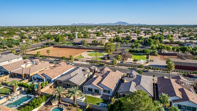 birds eye view of property featuring a mountain view