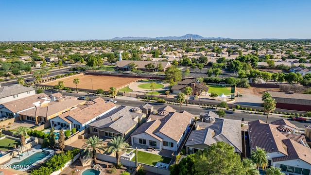 birds eye view of property featuring a mountain view