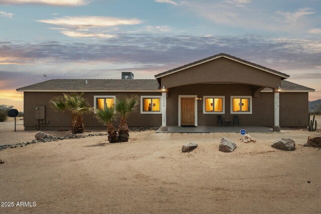 view of front of home with stucco siding