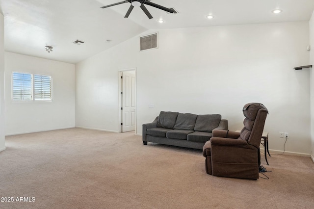 living area with visible vents, ceiling fan, light carpet, and baseboards