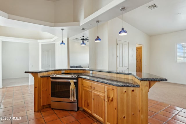 kitchen featuring visible vents, light tile patterned floors, a kitchen breakfast bar, electric stove, and light carpet