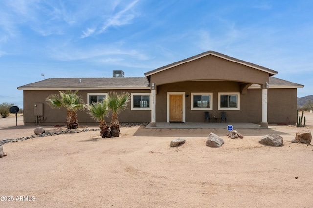 single story home with stucco siding