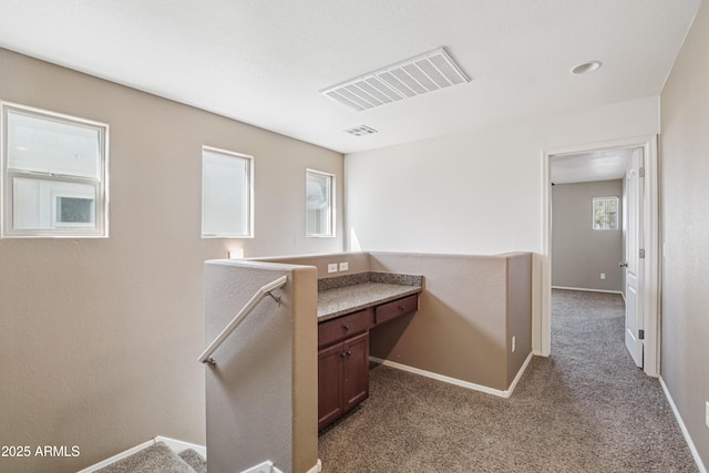 2947 N Evergreen St, Buckeye, AZ 85396 - hallway with an upstairs landing and dark carpet