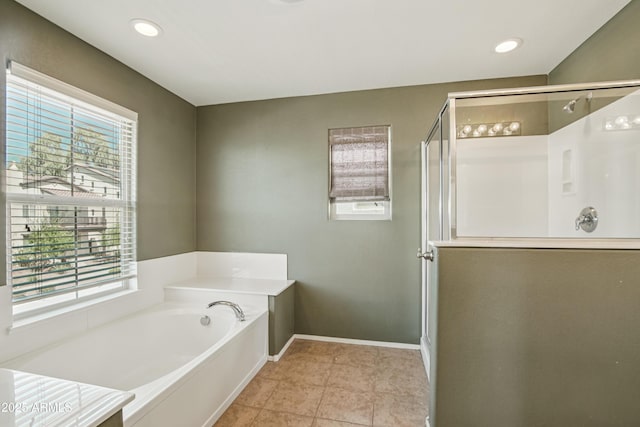2947 N Evergreen St, Buckeye, AZ 85396 - bathroom with a shower stall, a garden tub, recessed lighting, and tile patterned floors