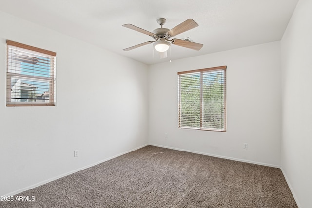 2947 N Evergreen St, Buckeye, AZ 85396 - carpeted empty room with a ceiling fan and baseboards