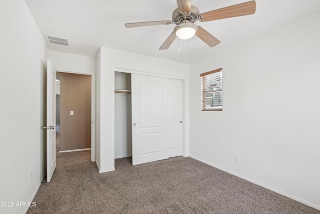 2947 N Evergreen St, Buckeye, AZ 85396 - unfurnished bedroom with carpet flooring, a closet, and ceiling fan