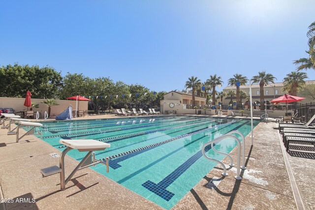 2947 N Evergreen St, Buckeye, AZ 85396 - community pool with a patio area