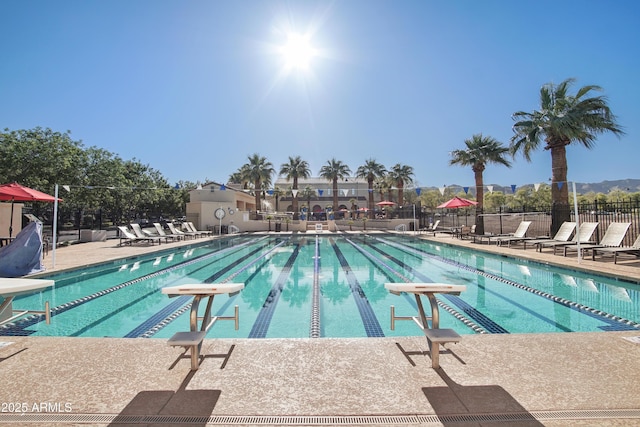 2947 N Evergreen St, Buckeye, AZ 85396 - community pool featuring a patio and a diving board