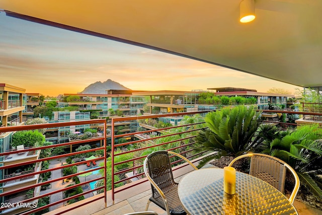 view of balcony at dusk