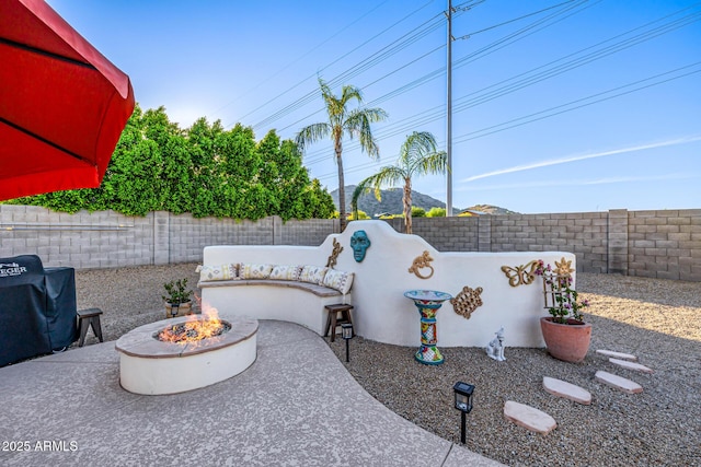 8132 W Hatfield Rd, Peoria, AZ 85383 - fenced backyard with an outdoor fire pit, grilling area, and a patio