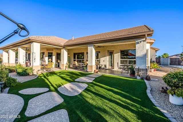 8132 W Hatfield Rd, Peoria, AZ 85383 - back of house with ceiling fan, a patio area, stucco siding, and a tiled roof