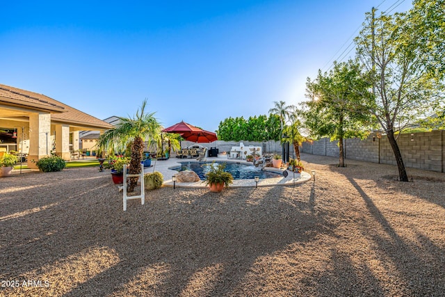 8132 W Hatfield Rd, Peoria, AZ 85383 - fenced backyard with a patio