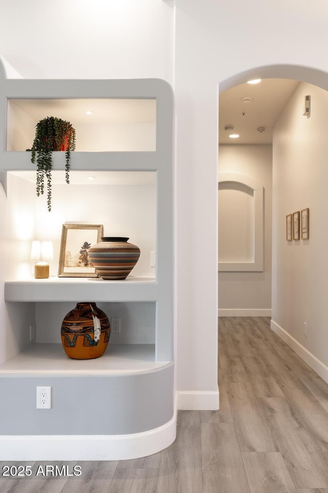 8132 W Hatfield Rd, Peoria, AZ 85383 - detailed view of wood finished floors and arched walkways