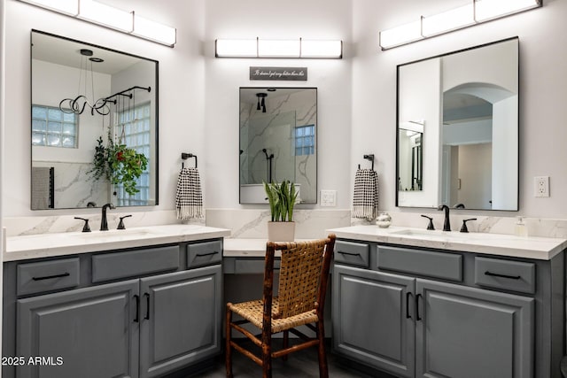 8132 W Hatfield Rd, Peoria, AZ 85383 - full bathroom featuring two vanities and a marble finish shower