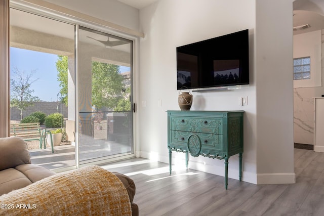 8132 W Hatfield Rd, Peoria, AZ 85383 - living area featuring wood finished floors and arched walkways
